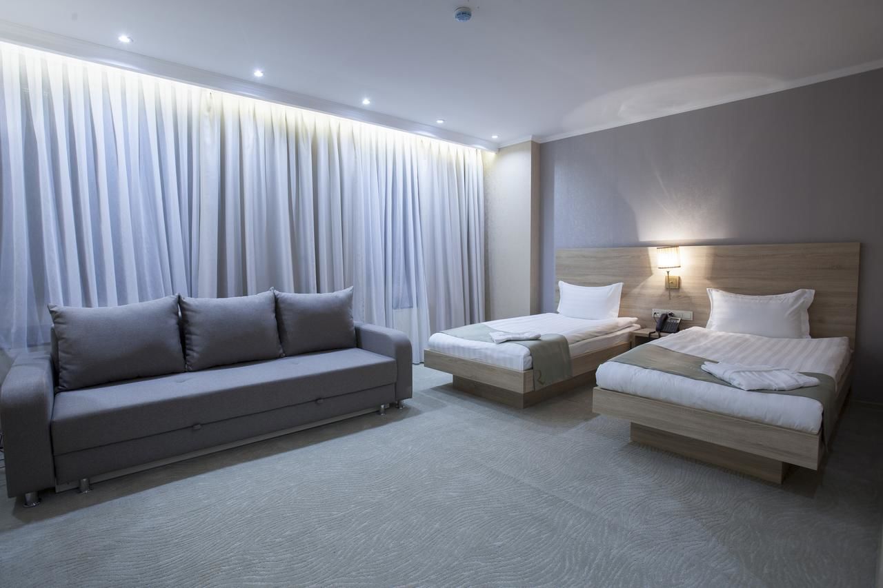 Отель Renion Park Hotel Алматы