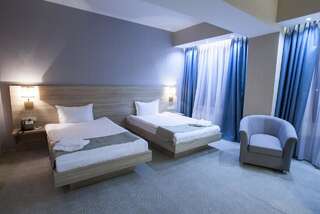 Отель Renion Park Hotel Алматы Улучшенный двухместный номер с 2 отдельными кроватями-6